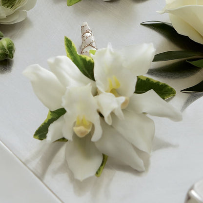 White Mini Cymbidium Boutonniere –  United Family Flower And Gifts, Brooklyn NY